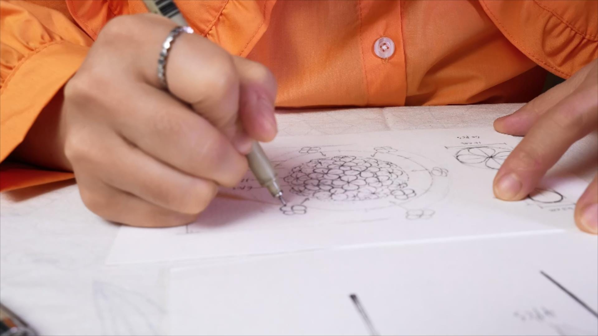 Flower design sketch for PaperGirlDIY's handmade paper flowers, combining creativity and sustainability.